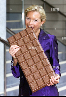 Woman holding a large chocolate bar