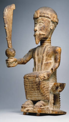 Statue of a king holding a sword